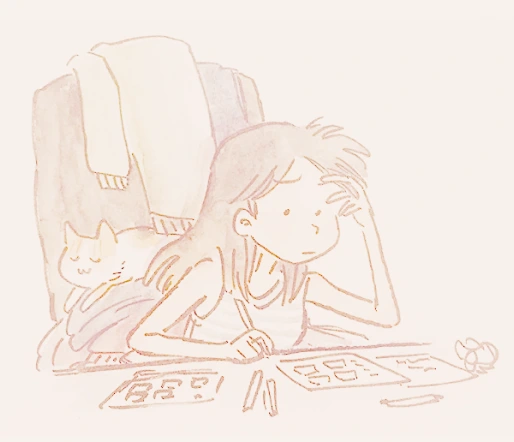 Paridhi drawing at her desk with Cheese the cat